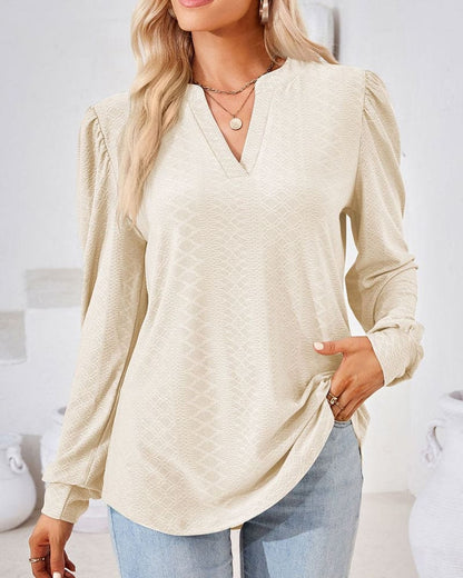 Snygg v-ringad långärmad blus för kvinnor