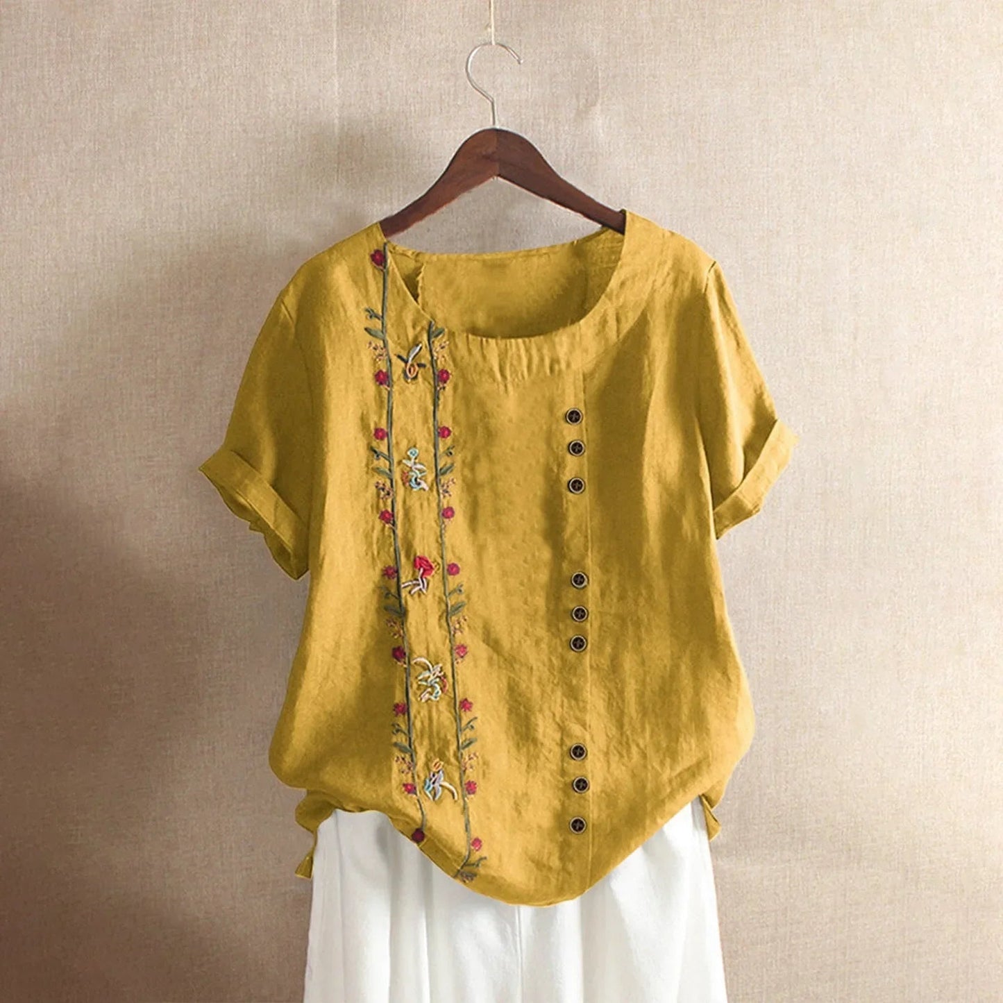 Löst sittande kortärmad blus med rund hals för kvinnor